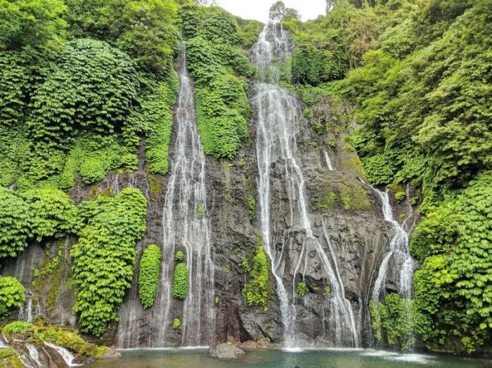 Twin waterfalls bali jungles amazing here considering refreshing cool water just